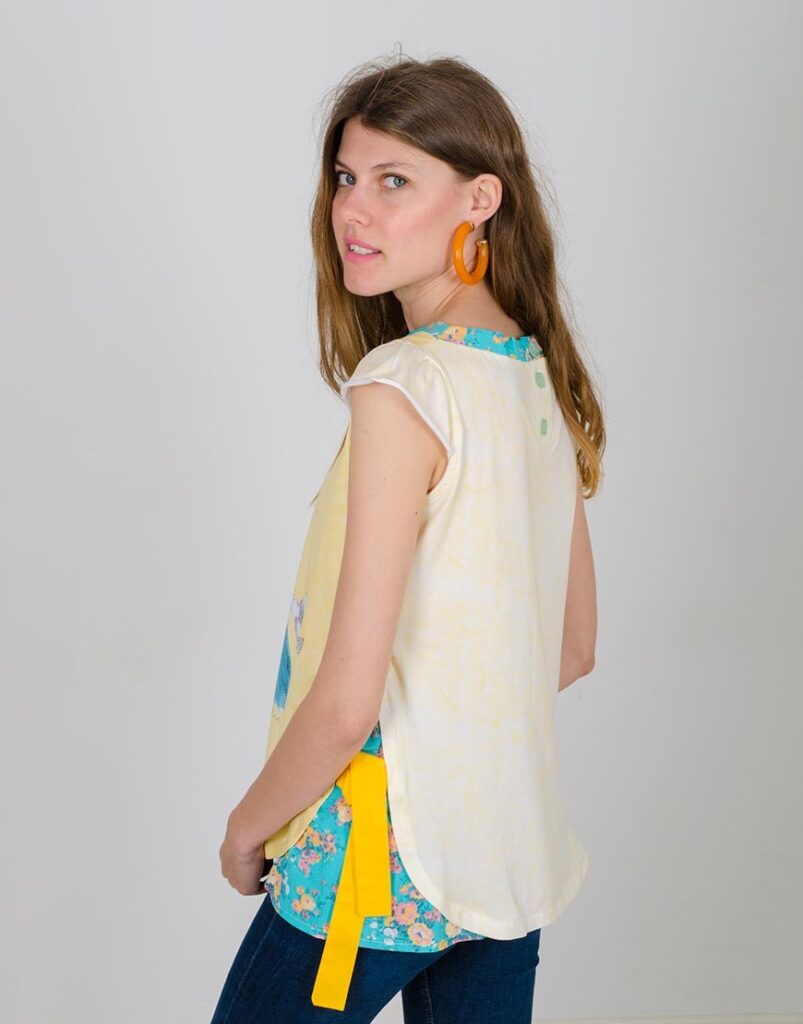 Camiseta La Emoción del Primer Vuelo detalle lateral