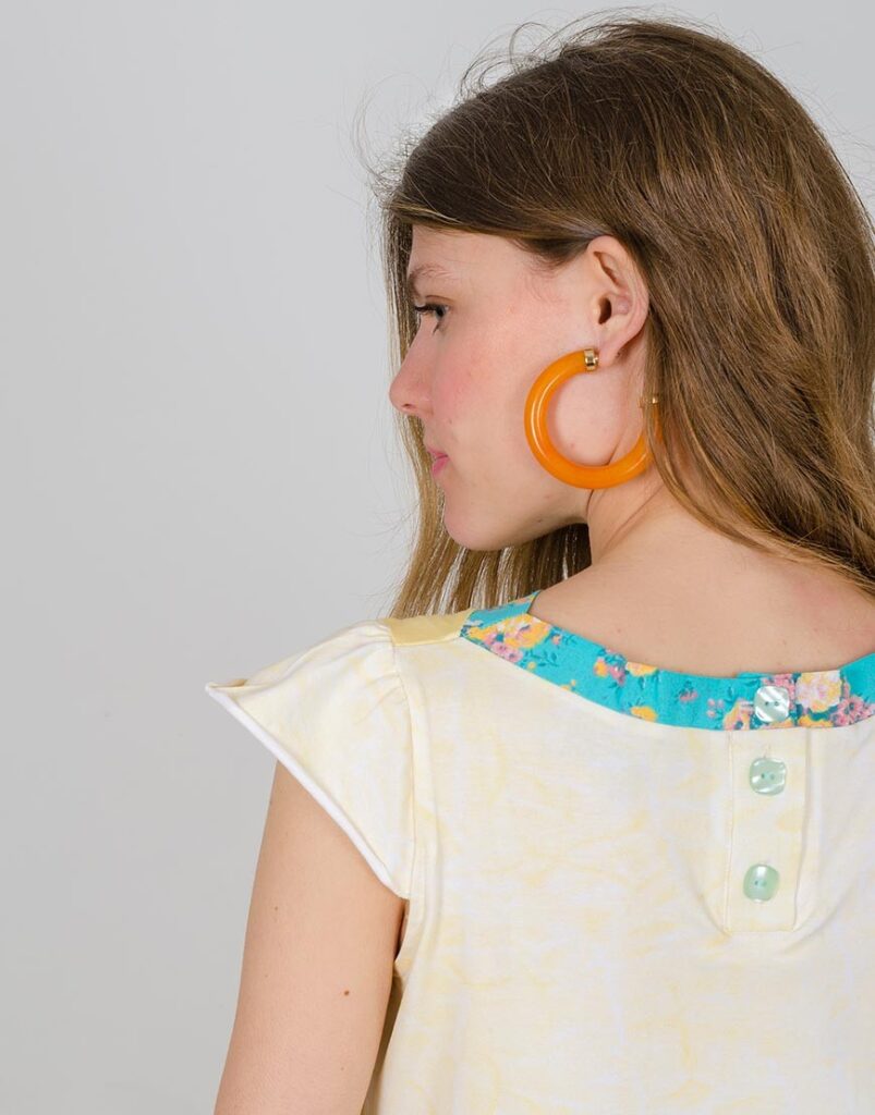 Camiseta La Emoción del Primer Vuelo detalle espalda