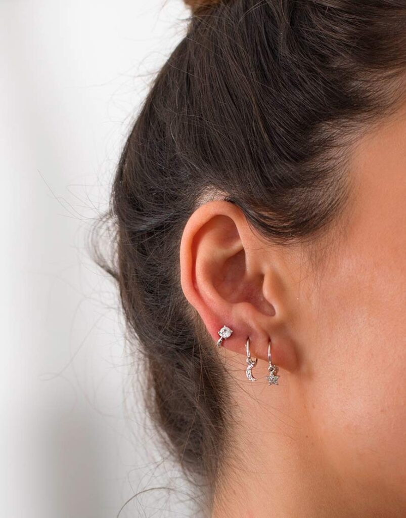 Pendientes piercing aro liso estrella colgante composición