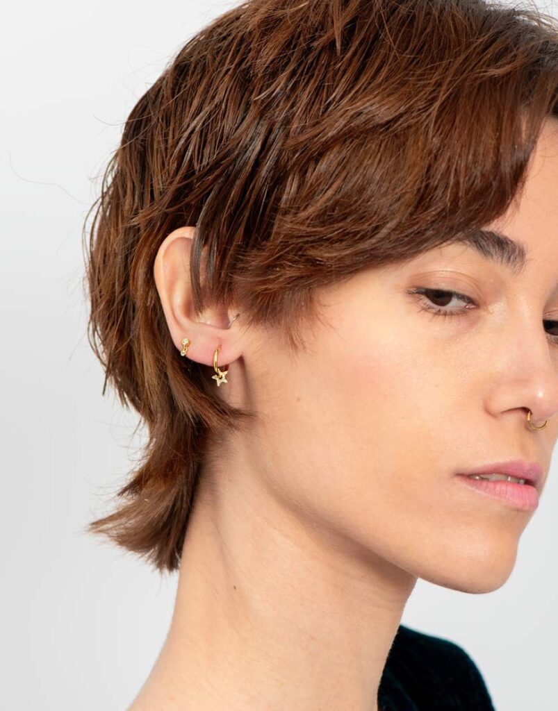 Pendiente piercing aro estrella circonitas