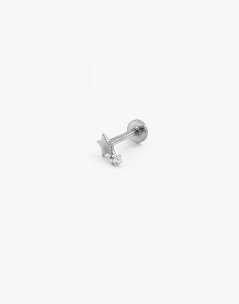 Piercing tragus estrella y diamante plata